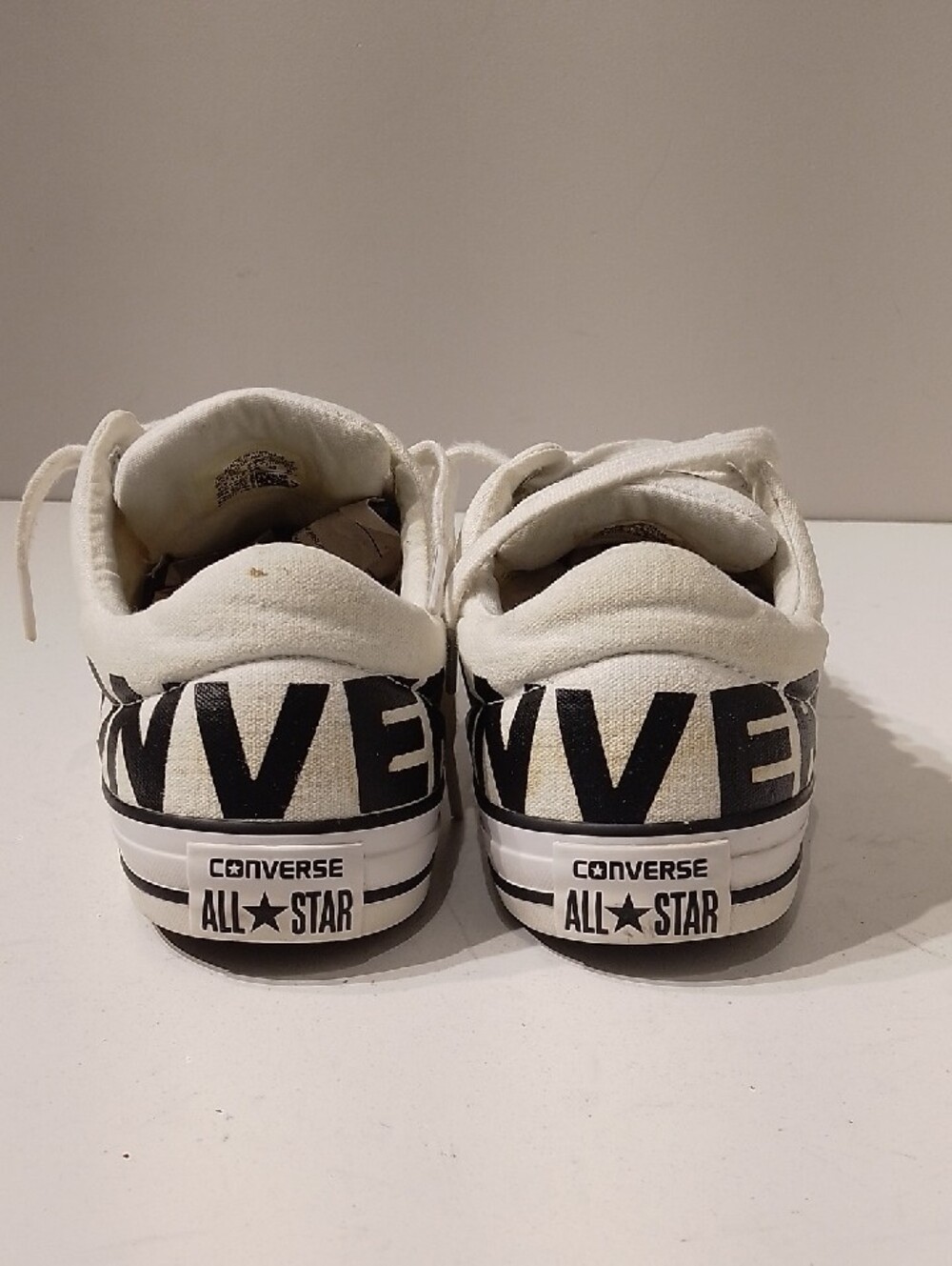 Converse White Low-Top Canvas Sneakers with Black Accents - Picture 3 of 7